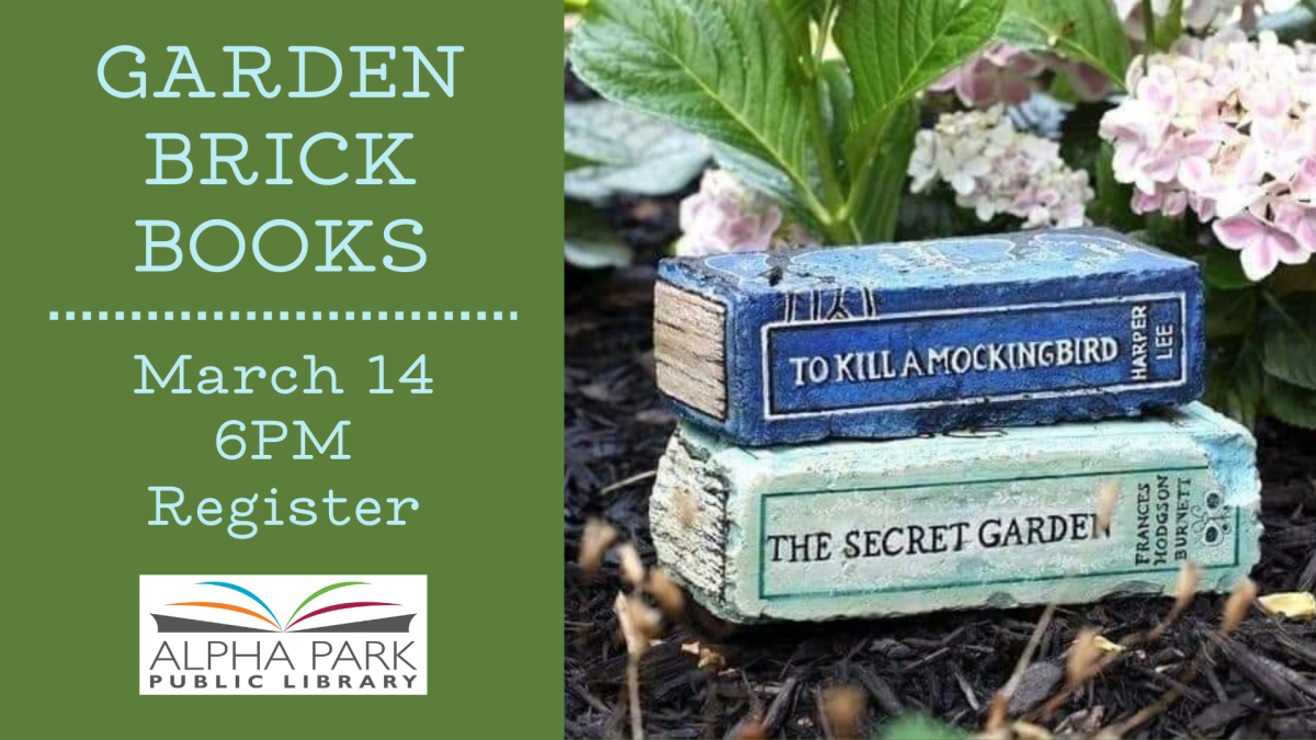 photo of two bricks painted like books stacked in garden bed, green rectangle with light blue text